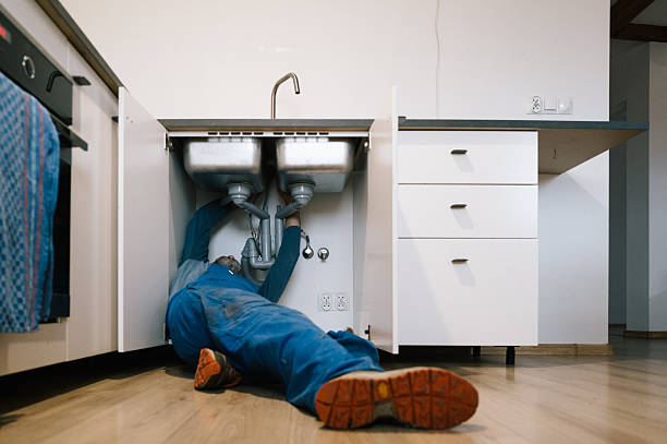 Professional Drain Cleaning technician working in Grovespring, MO